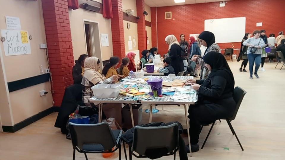 Members at an NLMWA community fundraising event